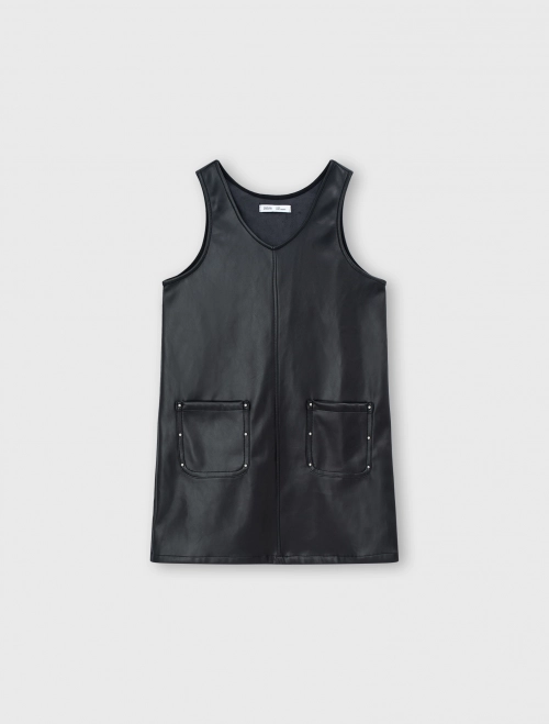 Váy yếm da bé gái