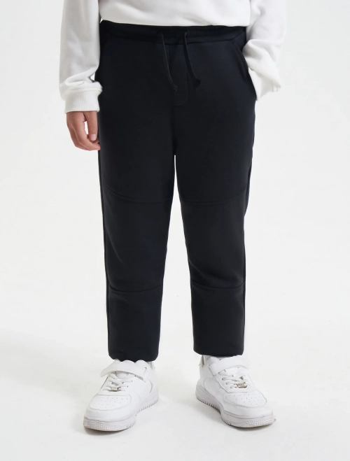 Quần nỉ bé trai can phối gối dáng suông