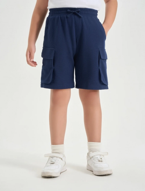 Quần soóc nỉ bé trai túi hộp