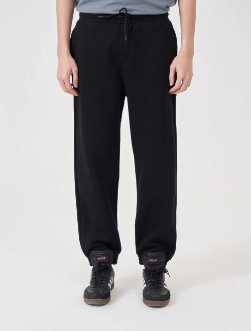 Quần nỉ nam dáng jogger chun gấu