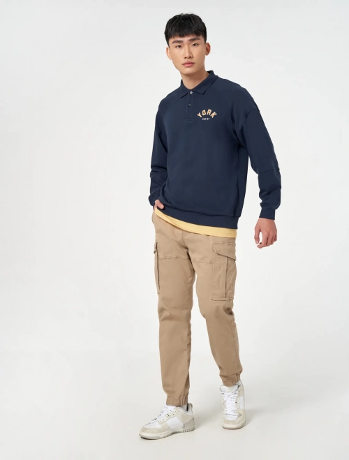 Áo nỉ nam cổ polo có hình in dáng oversize